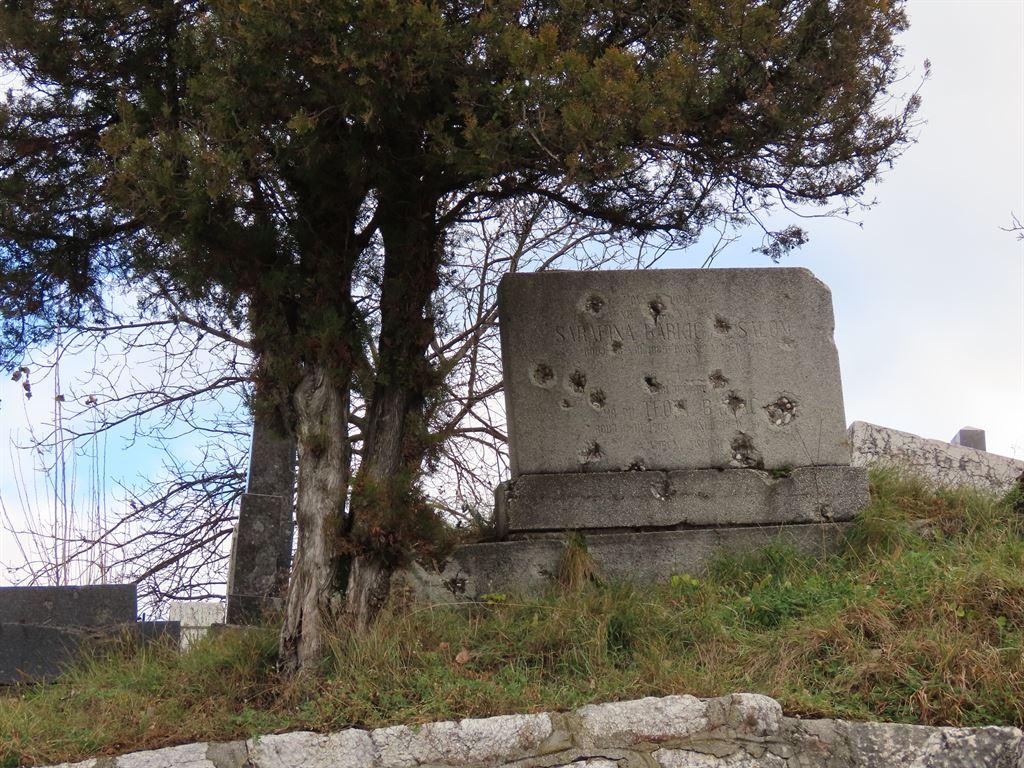 pockedheadstone